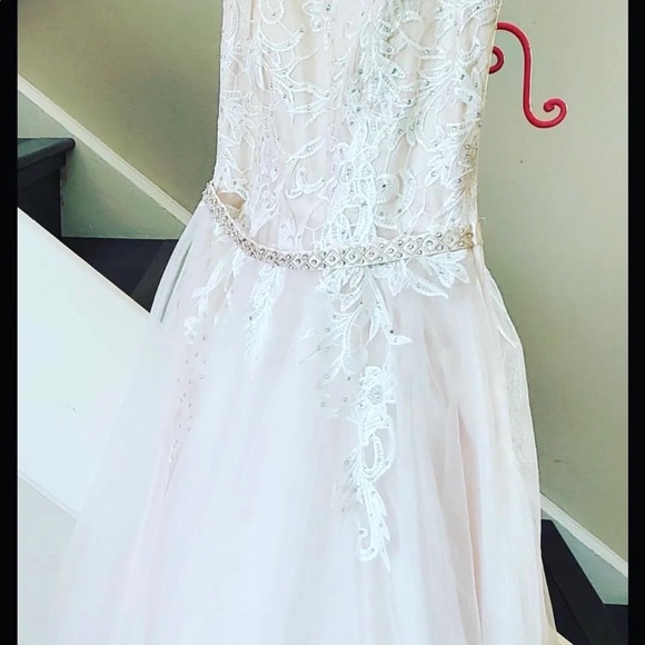 Beautiful sheer white with hints of pink prom dress never worn. Size 4 - Picture 15 of 15